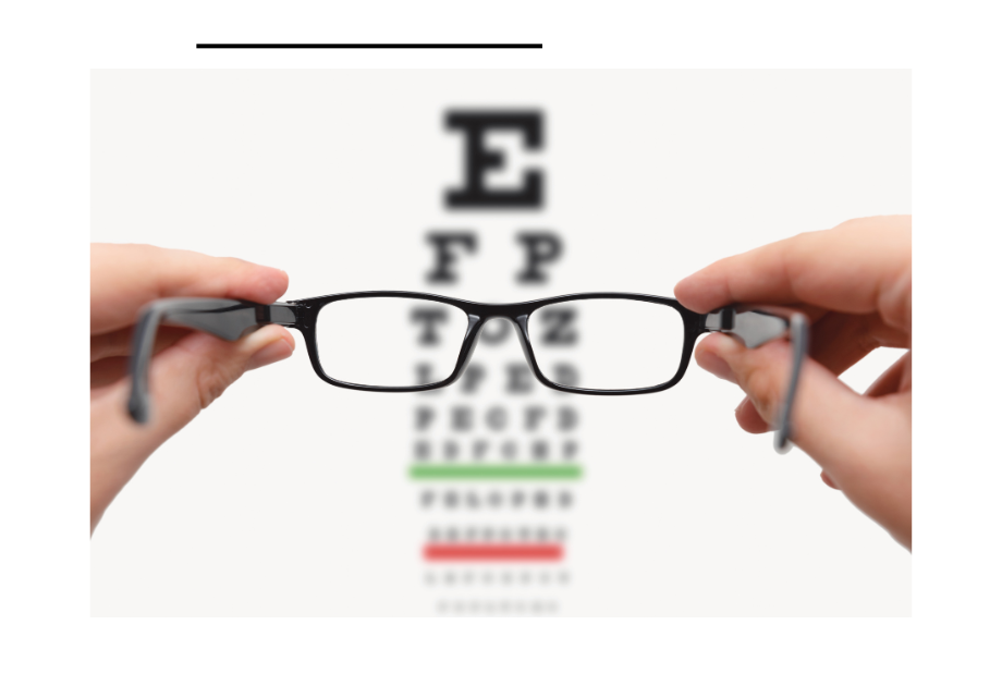 Hands hold a pair of glasses with a letter chart out of focus behind